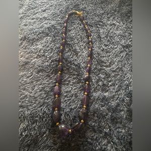 Purple and Gold.  Colors for the Queen.